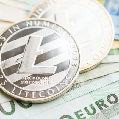 Litecoin and euro banknotes.